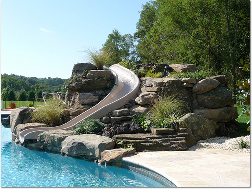 Pool Slides added on to our swimming pools